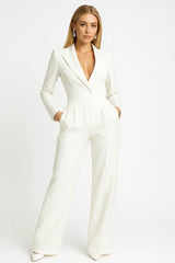 Elegant buksedragt med blazer-look – lange ben, taljeret pasform og stilfuldt V-snit - Havn Studio